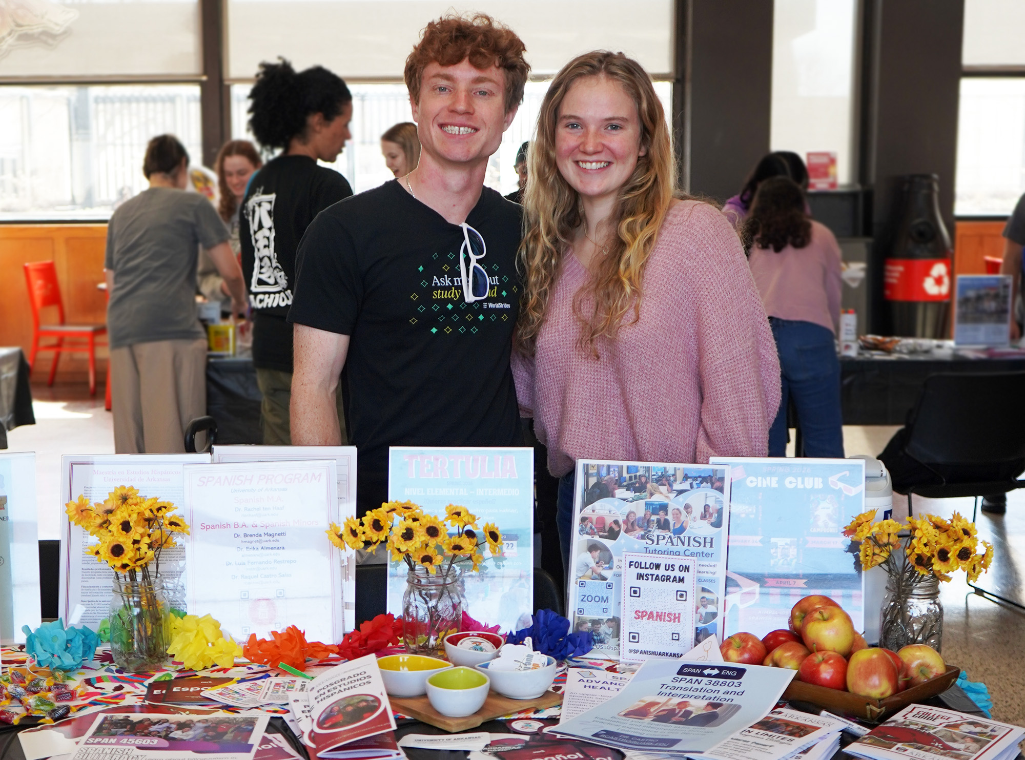Photo from the Language and Culture Connections Fair held March 3. Two students at the Spanish Program's table for the Language and Culture Connections Fair.