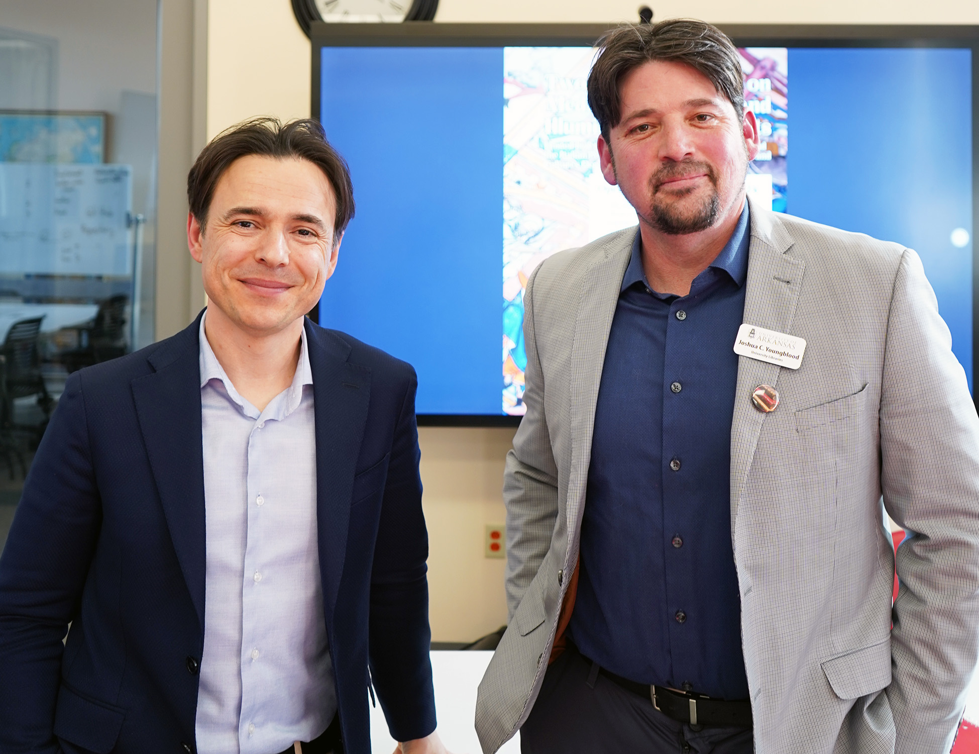 Giovanni Scorcioni (left) and Joshua Youngblood (right) at the "Facsimiles vs Digital Images: A Conversation on Manuscript Studies" panel at the symposium. Left: Giovanni Scorcioni, founder of Facsimile Finder. Right: Joshua Youngblood, associate dean of Special Collections.
